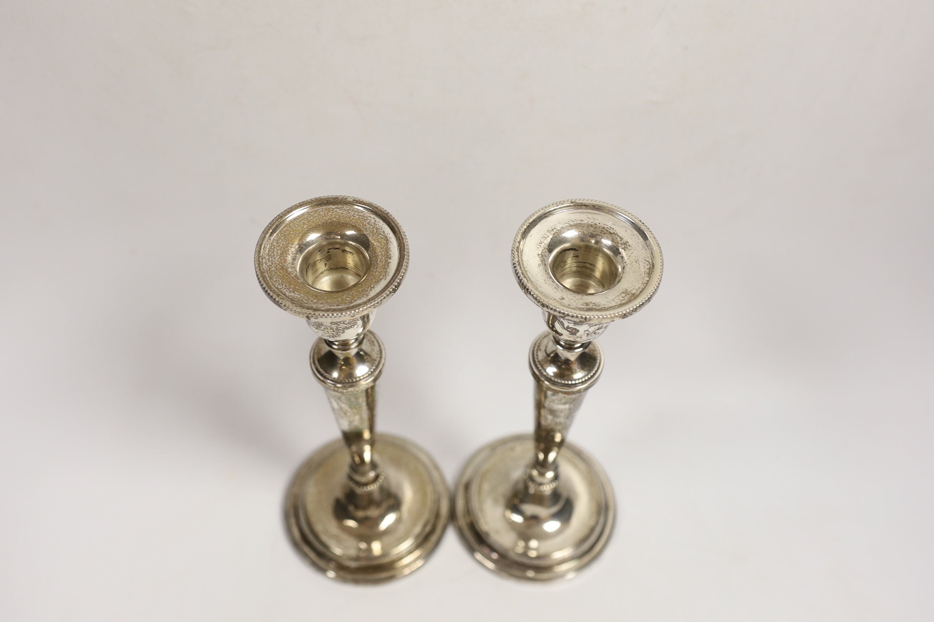 A pair of modern silver mounted candlesticks, London, 2005, 22.3cm.